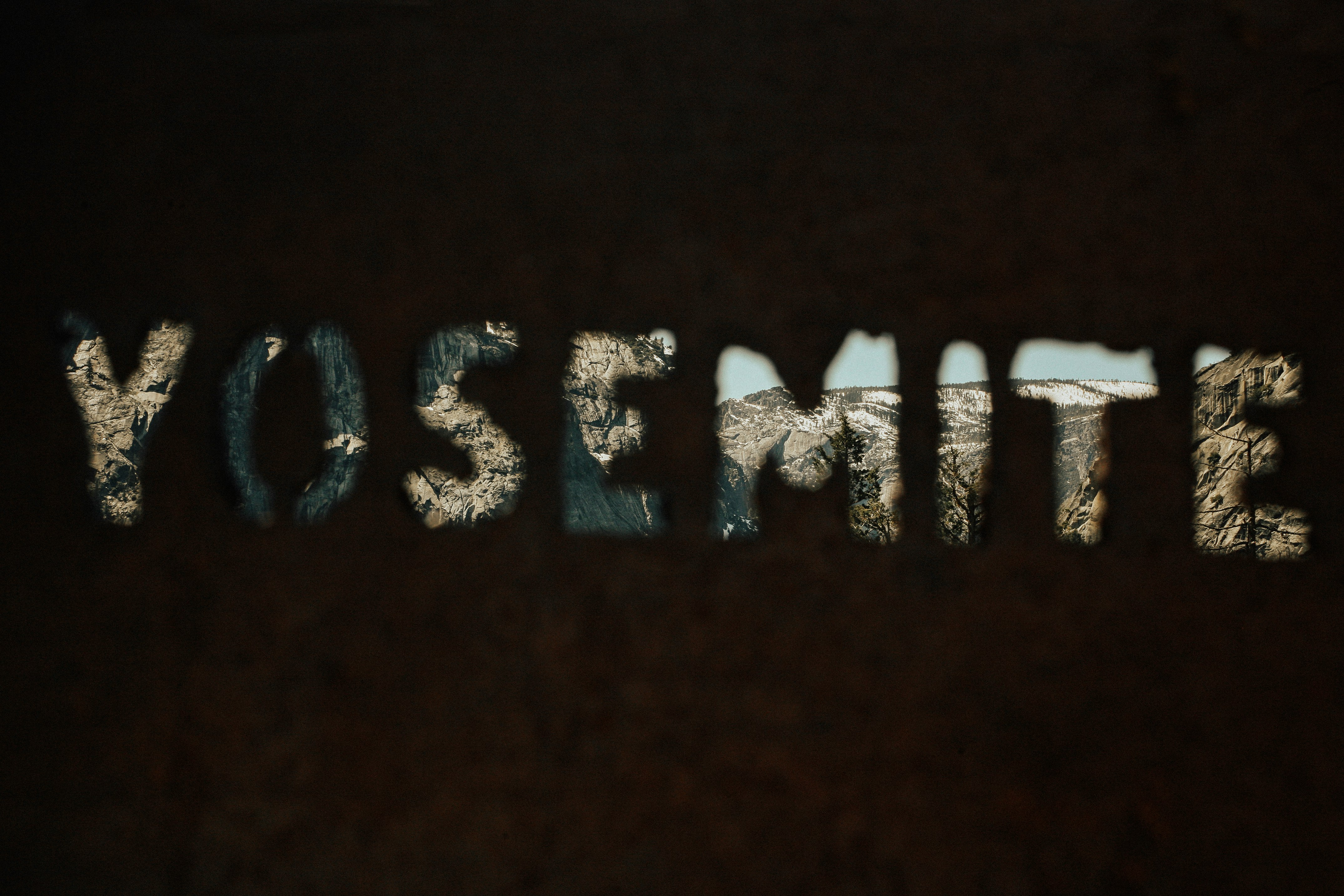 Yosemite text against black background